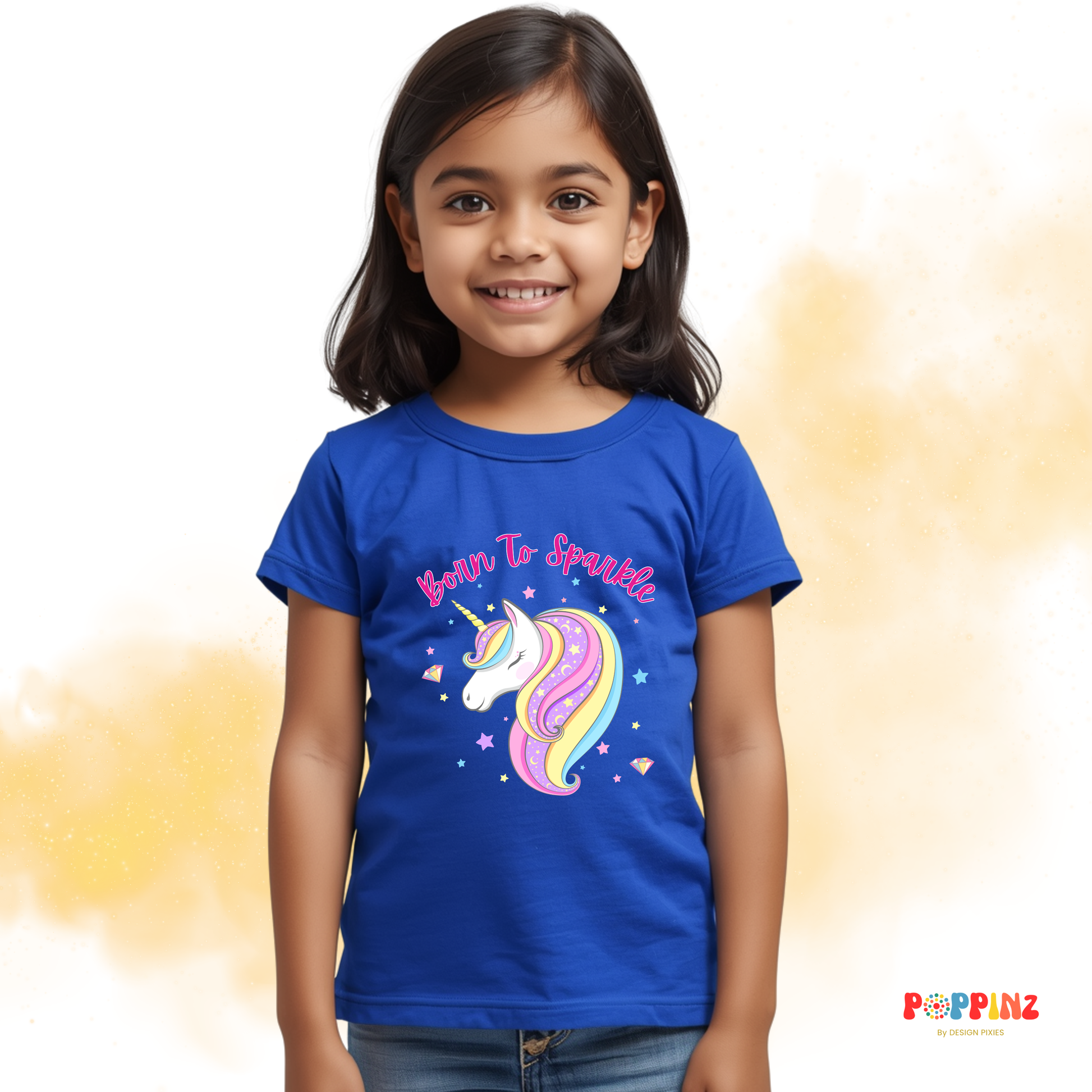 Young girl wearing a royal blue t-shirt with a unicorn design and text Born to Sparkle -Design Pixies